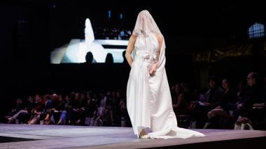 A model walks the runway at the 42nd Cornell Fashion Collective Spring Runway Show.
