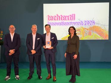 FET’s Managing Director Richard Slack and Senior Scientist Kristoffer Kortsen (centre) receive the Innovation Award